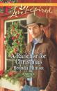 Скачать A Rancher for Christmas - Brenda Minton